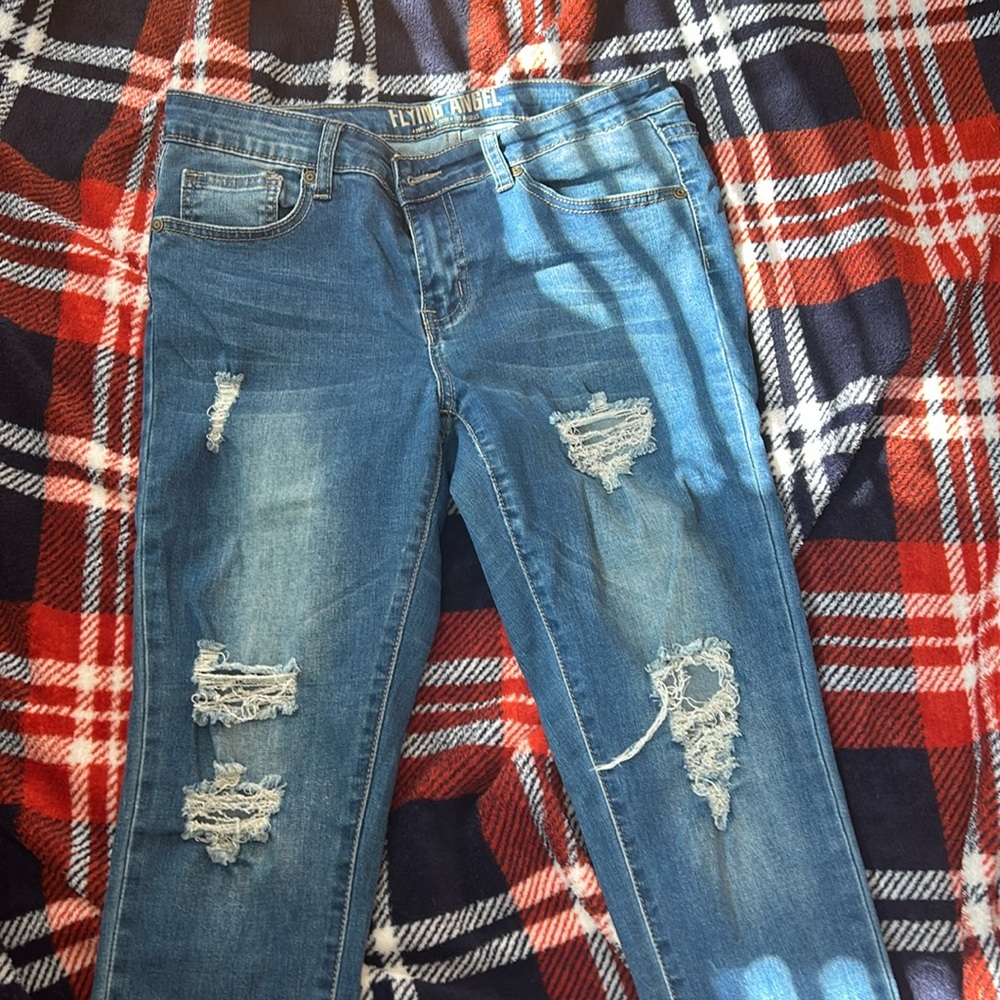 Washed off jeans in a size 9 never worn in very good condition